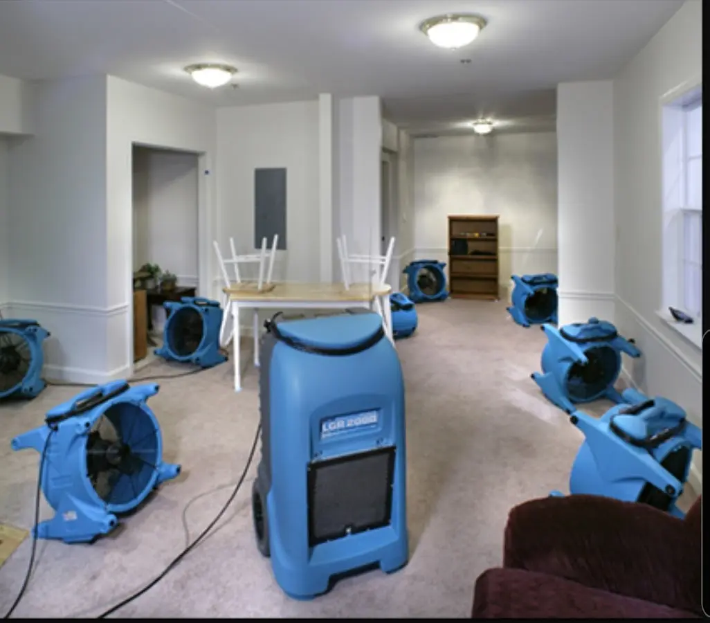 Air movers and dehumidifier setup for Water Extraction & Removal in McSwain